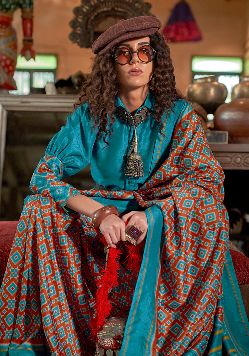 Monjolika Fashion Aqua Blue and Rust Silk Blend Ikat Print Work Contemporary Saree | Grocsy