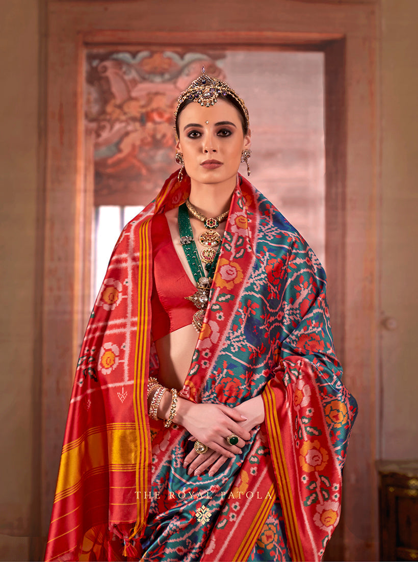 Monjolika Fashion Teal Silk Blend Patola Print Saree with Red Blouse | Grocsy