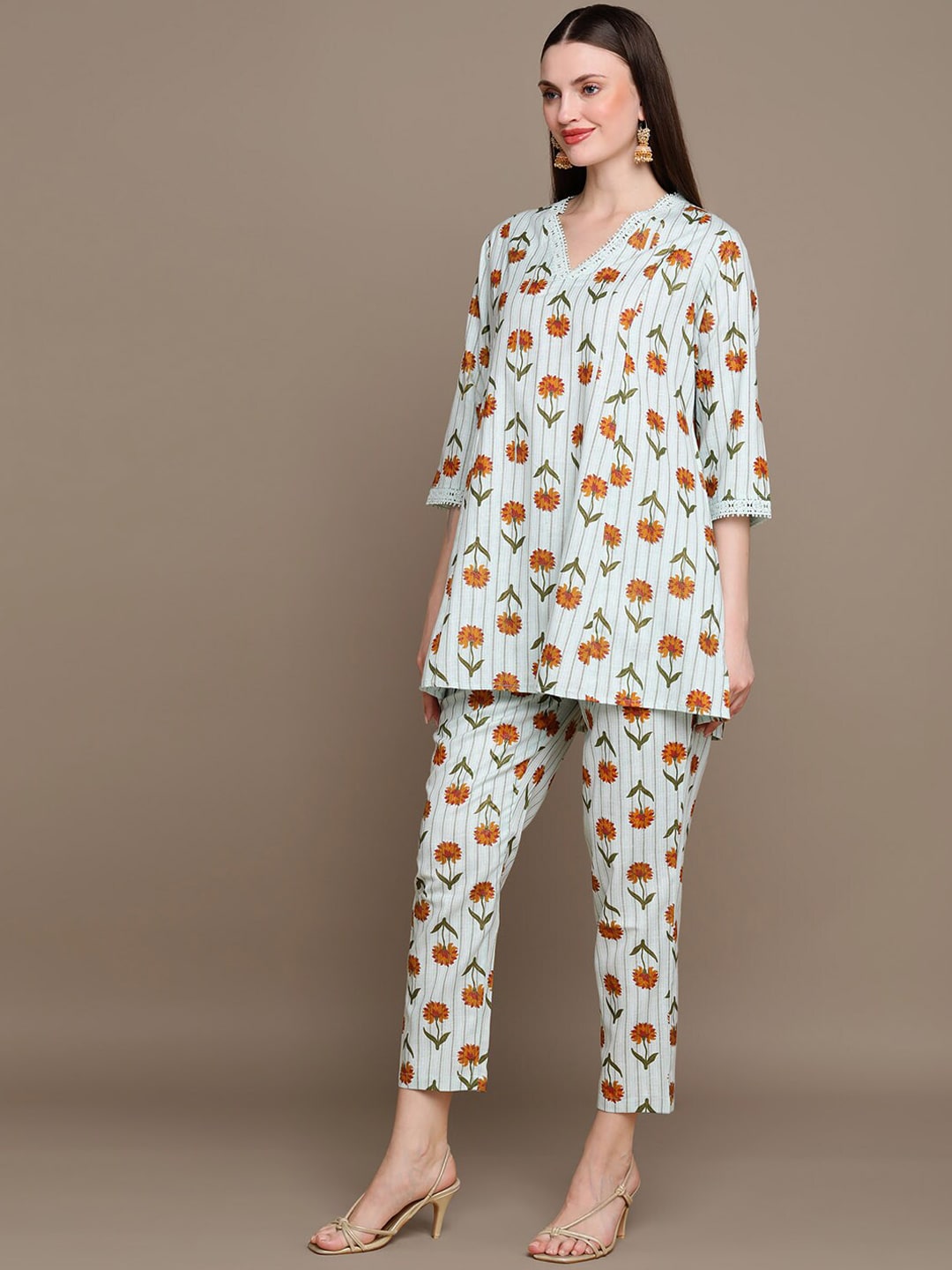 HERE&NOW Floral Printed Lace Inserted V-Neck Kurti with Trousers | Grocsy