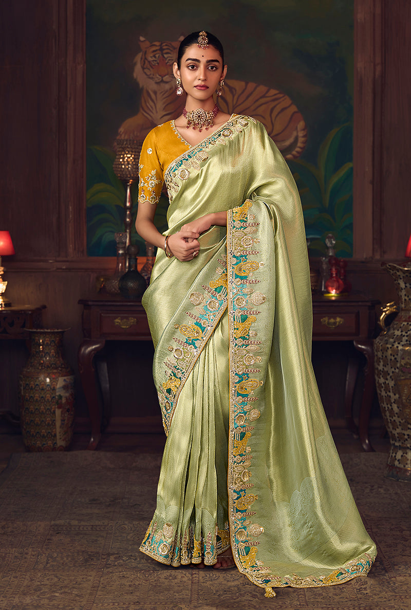 Monjolika Fashion Light Green Zari Woven Silk Blend Embroidered Saree For Wedding Wear | Grocsy