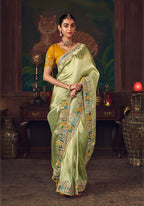 Monjolika Fashion Light Green Zari Woven Silk Blend Embroidered Saree For Wedding Wear | Grocsy