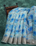 Powder Blue And Dark Blue Coloured Floral Print Semi Chanderi Saree By Gayathri Reddy Designer Studio | Grocsy