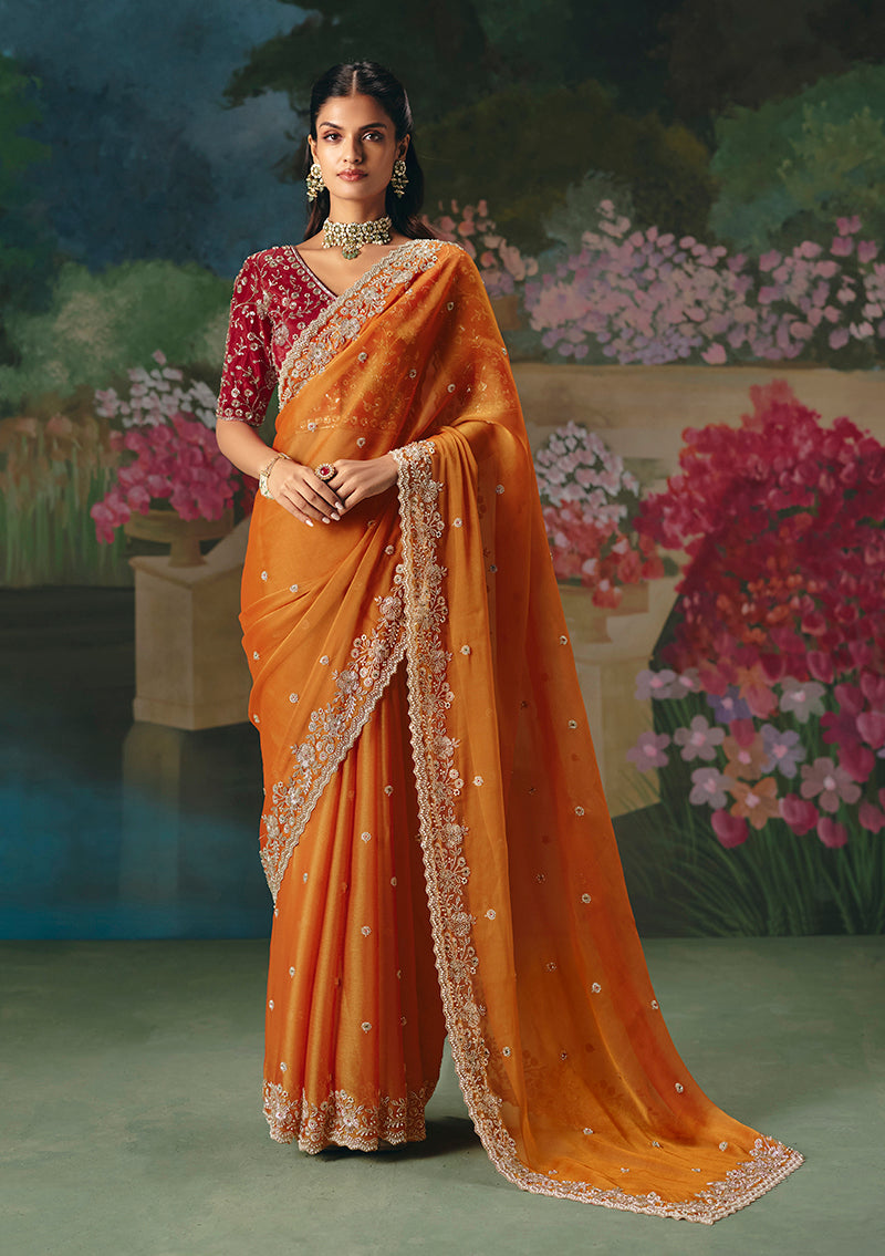 Monjolika Fashion Fancy Fabric Embroidered Saree in Orange | Grocsy