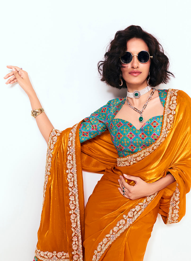 Monjolika Fashion Fancy Fabric Embroidered Orange Saree | Grocsy