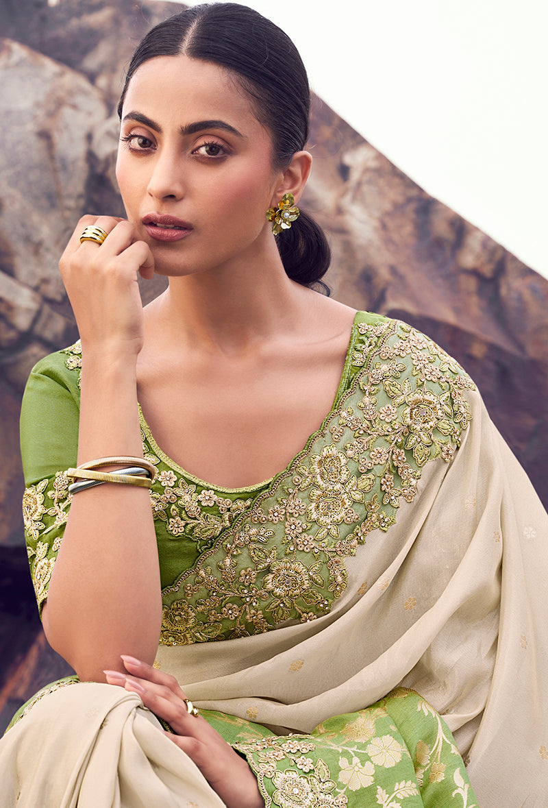 Monjolika Fashion Beige & Green Embroidered Woven Faux Tissue Silk Saree | Grocsy