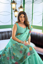 Monjolika Fashion Turquoise Floral Printed Linen Jacquard Saree with unstiched Blouse Piece | Grocsy