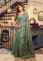 Monjolika Fashion Sage Green Cotton Blend Saree With Litchi Work & Tassels | Grocsy