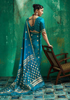 Monjolika Fashion Teal Blue Satin Silk Blend Saree with Gold Zari Buti | Grocsy