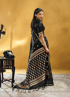 Monjolika Fashion Black Satin Silk Blend Saree with Gold Zari Buti | Grocsy
