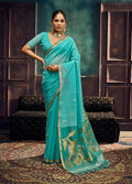 Monjolika Fashion Aqua Blue Linen Silk Blend Saree with Gold Zari Border & Floral Pallu | Grocsy