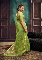 Monjolika Fashion Light Green Linen Silk Blend Saree with Gold Zari Border & Floral Pallu | Grocsy
