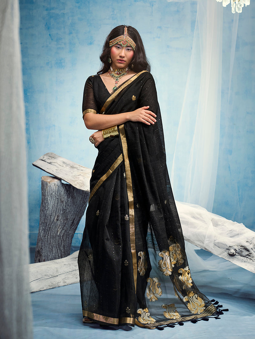 Monjolika Fashion Black Linen Silk Blend Saree with Gold Zari Border & Floral Woven Pallu | Grocsy