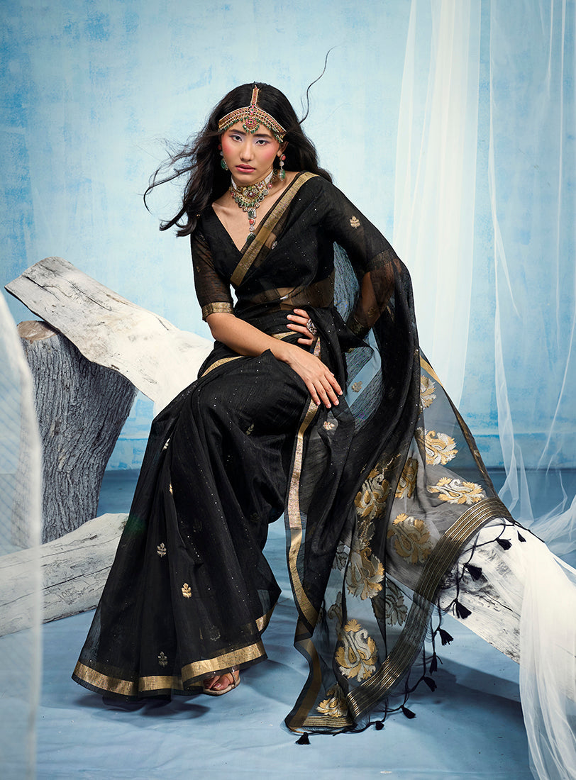 Monjolika Fashion Black Linen Silk Blend Saree with Gold Zari Border & Floral Woven Pallu | Grocsy