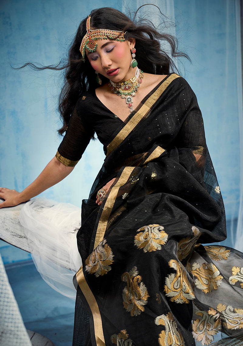 Monjolika Fashion Black Linen Silk Blend Saree with Gold Zari Border & Floral Woven Pallu | Grocsy