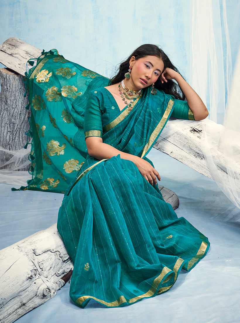 Monjolika Fashion Teal Blue Linen Silk Blend Saree with Gold Zari Border & Floral Woven Pallu | Grocsy