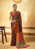 Monjolika Fashion Brown Satin Printed Saree With Orange Border And Unstiched Blouse | Grocsy