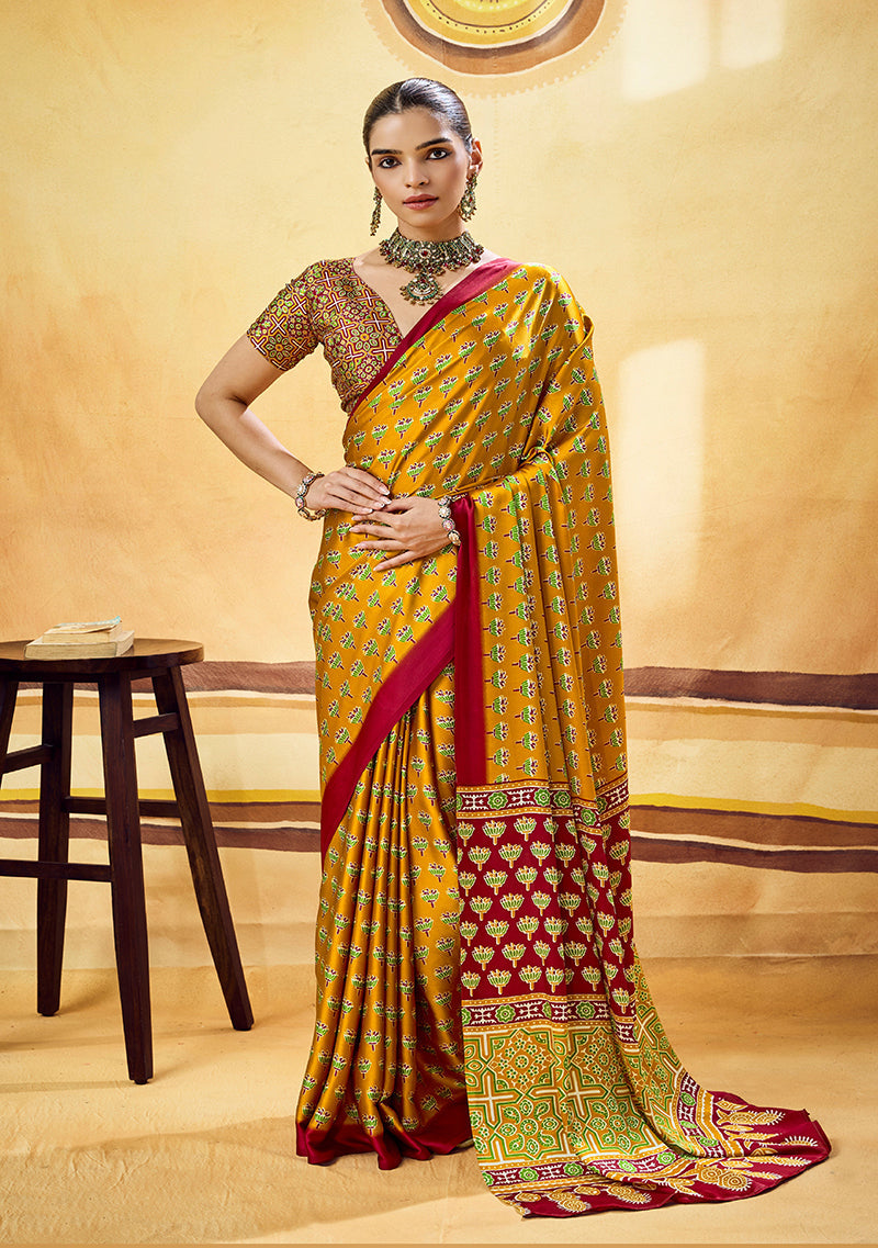 Monjolika Fashion Mustard Satin Printed Saree With Orange Border And Unstiched Blouse | Grocsy