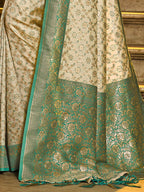 Monjolika Fashion Cream Banarasi Silk Blend Saree with Sea Green Zari Border | Grocsy