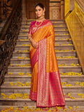Monjolika Fashion Orange Banarasi Silk Blend Saree with Magenta Zari Border | Grocsy