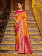 Monjolika Fashion Orange Banarasi Silk Blend Saree with Magenta Zari Border | Grocsy