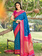 Monjolika Fashion Royal Blue & Rani Pink Banarasi Silk Blend Saree with Zari Woven Border | Grocsy