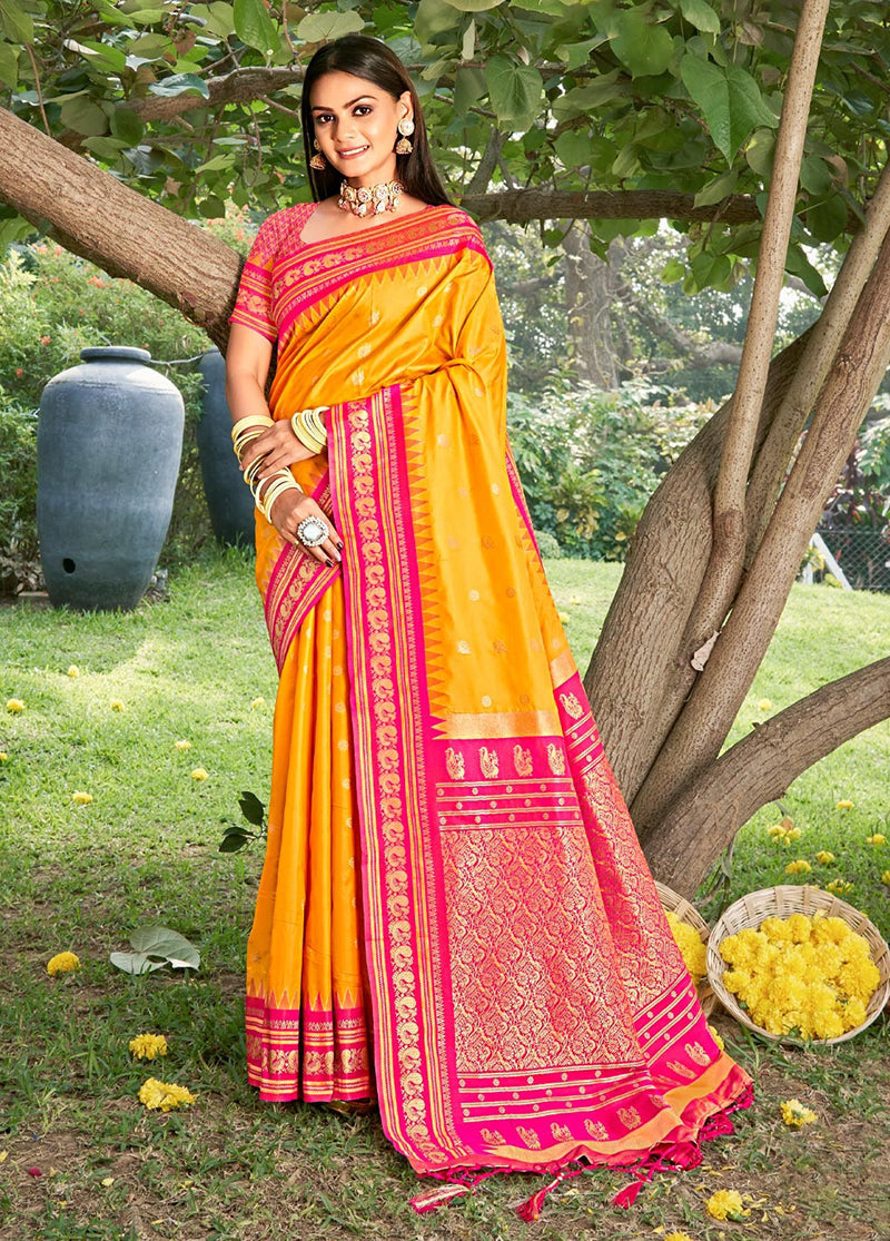 Monjolika Fashion Mustard & Rani Pink Banarasi Silk Blend Saree with Zari Woven Border | Grocsy