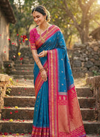 Monjolika Fashion Royal Blue Banarasi Silk Blend Saree with Rani Pink Zari Border | Grocsy