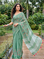 Monjolika Fashion Sea Green Linen Cotton Blend Saree with Floral Embroidery & Tassel Pallu | Grocsy