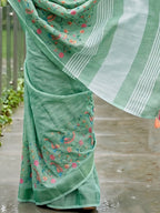 Monjolika Fashion Sea Green Linen Cotton Blend Saree with Floral Embroidery & Tassel Pallu | Grocsy