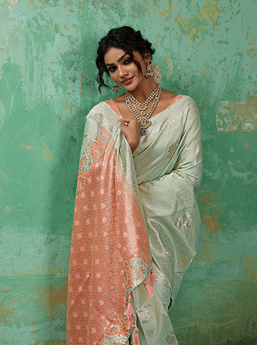 Monjolika Fashion Mint Green & Peach Zari Woven Linen Silk Bend Saree with Floral Motifs | Grocsy