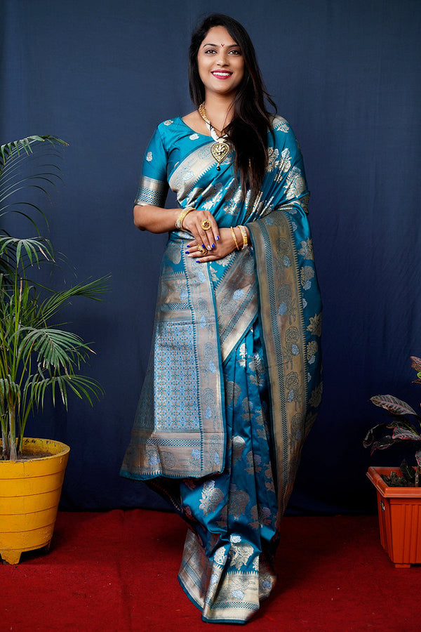 Monjolika Fashion Teal Blue Woven Banarasi Silk Blend Saree With Blouse