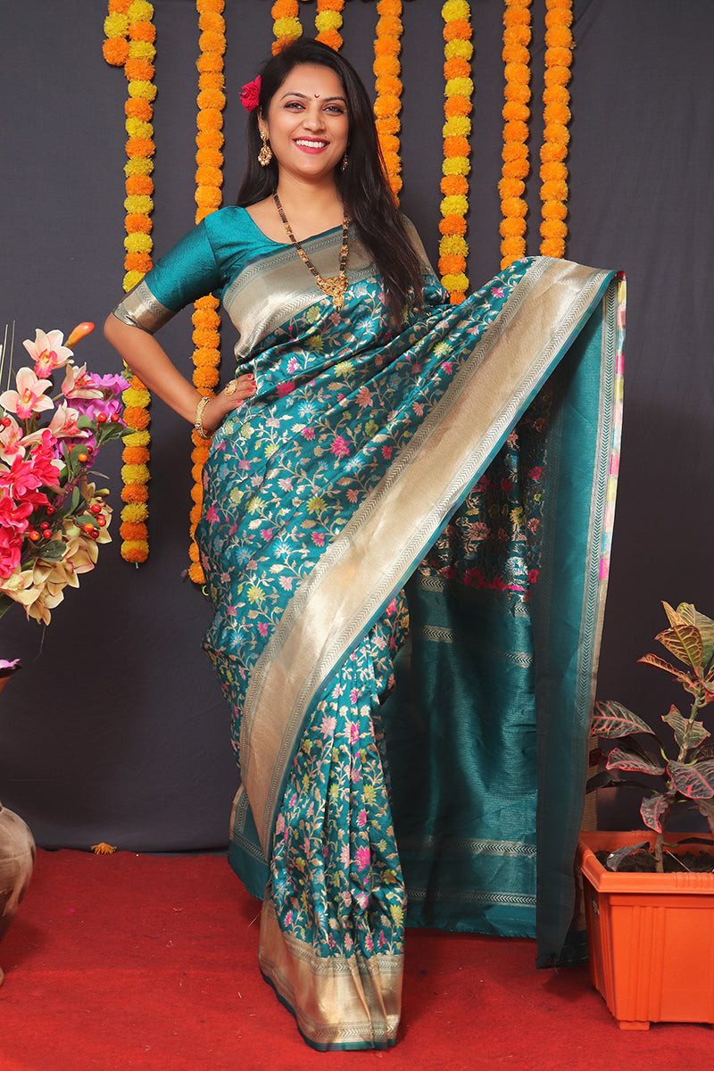Monjolika Fashion Teal Blue Banarasi Silk Blend Saree With Floral Jaal & Zari Border | Grocsy
