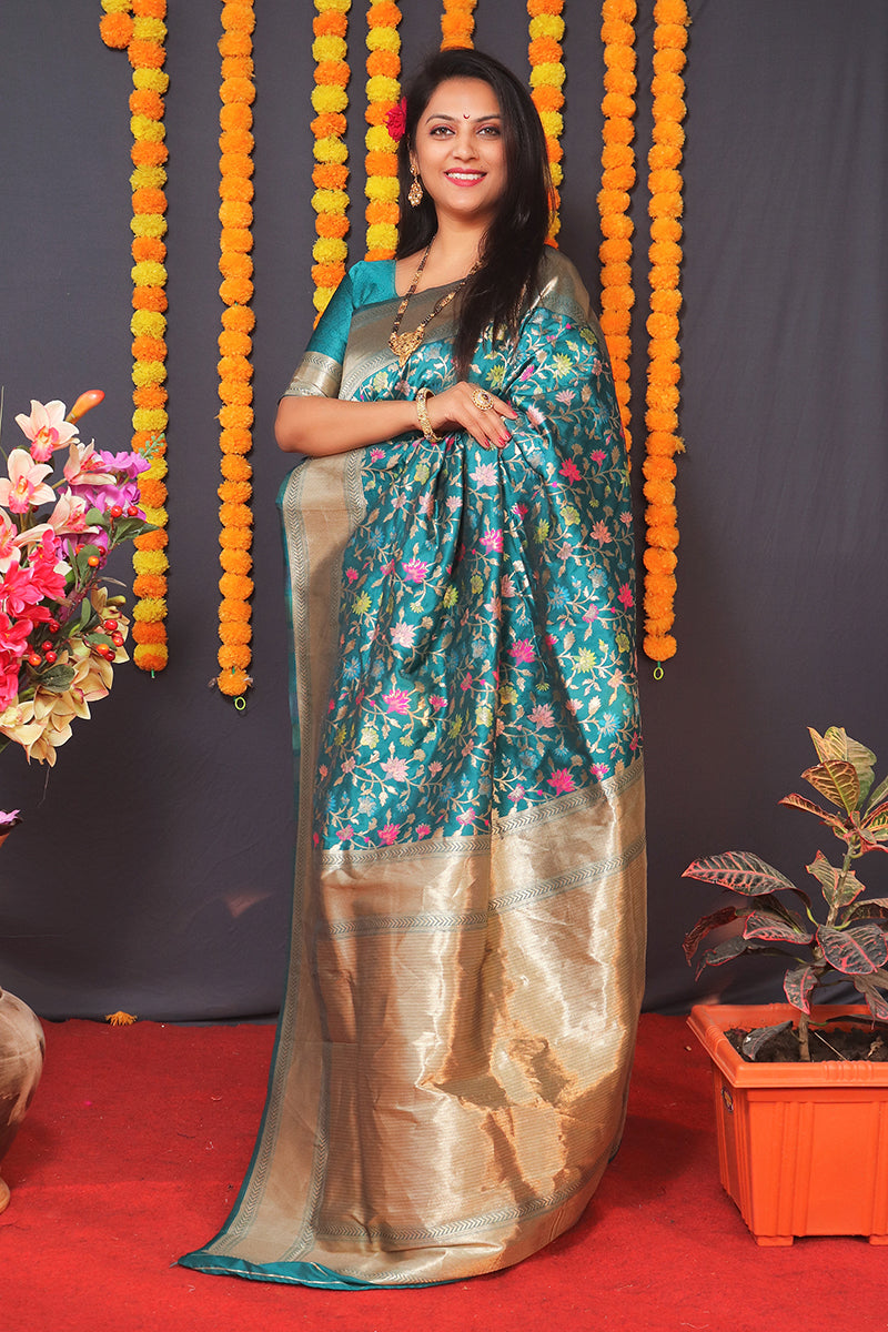 Monjolika Fashion Teal Blue Banarasi Silk Blend Saree With Floral Jaal & Zari Border | Grocsy