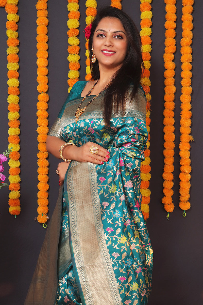 Monjolika Fashion Teal Blue Banarasi Silk Blend Saree With Floral Jaal & Zari Border | Grocsy