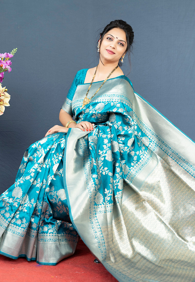 Monjolika Fashion Aqua Blue Banarasi Silk Blend Saree With Floral Zari Weaving | Grocsy