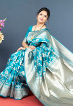 Monjolika Fashion Aqua Blue Banarasi Silk Blend Saree With Floral Zari Weaving | Grocsy