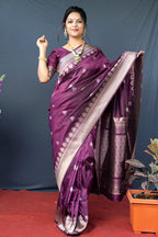 Monjolika Fashion Wine Purple Banarasi Silk Blend Saree with Silver Zari Border & Woven Pallu | Grocsy