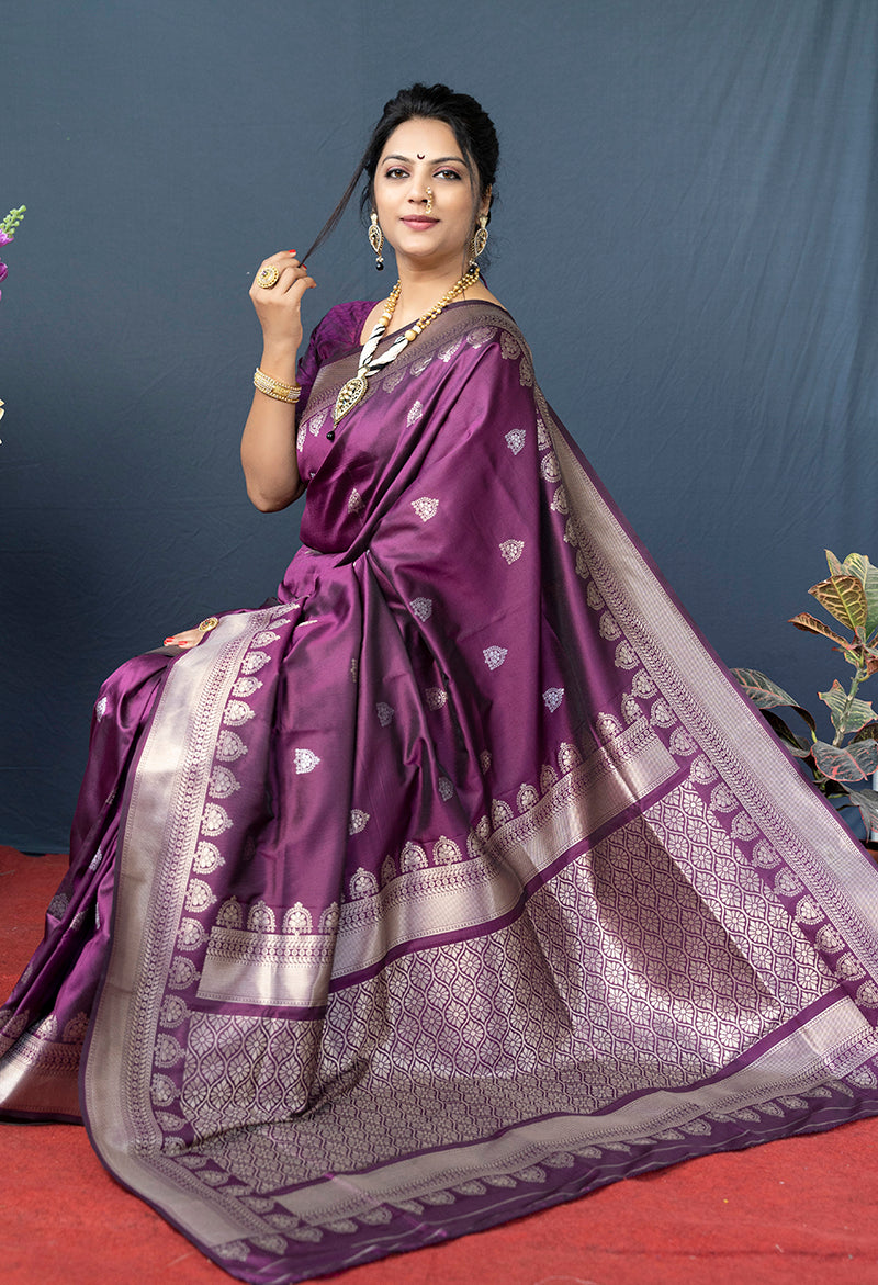 Monjolika Fashion Wine Purple Banarasi Silk Blend Saree with Silver Zari Border & Woven Pallu | Grocsy