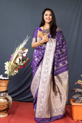 Monjolika Fashion Purple Banarasi Silk Blend Saree With Zari Border & Woven Pallu | Grocsy
