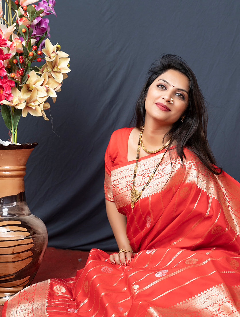 Monjolika Fashion Red Banarasi Silk Blend Saree With Zari Border & Woven Pallu | Grocsy