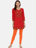 Souchii Orange Solid Slim-Fit Churidar-Length Leggings | Grocsy