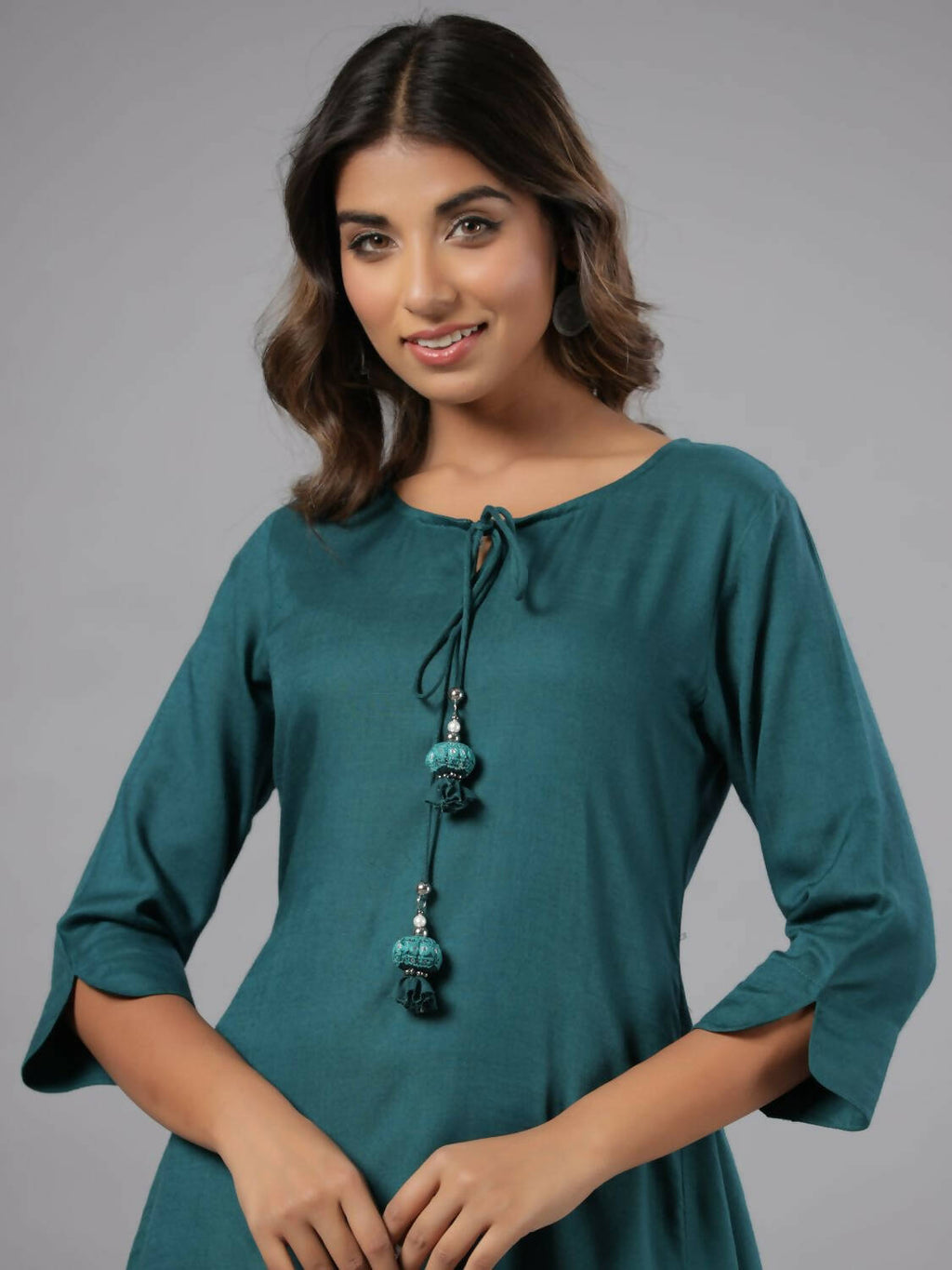 Juniper Women Teal Rayon Solid Asymmetric Kurta | Grocsy