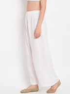 TAG 7 Women White Solid Straight Palazzos | Grocsy