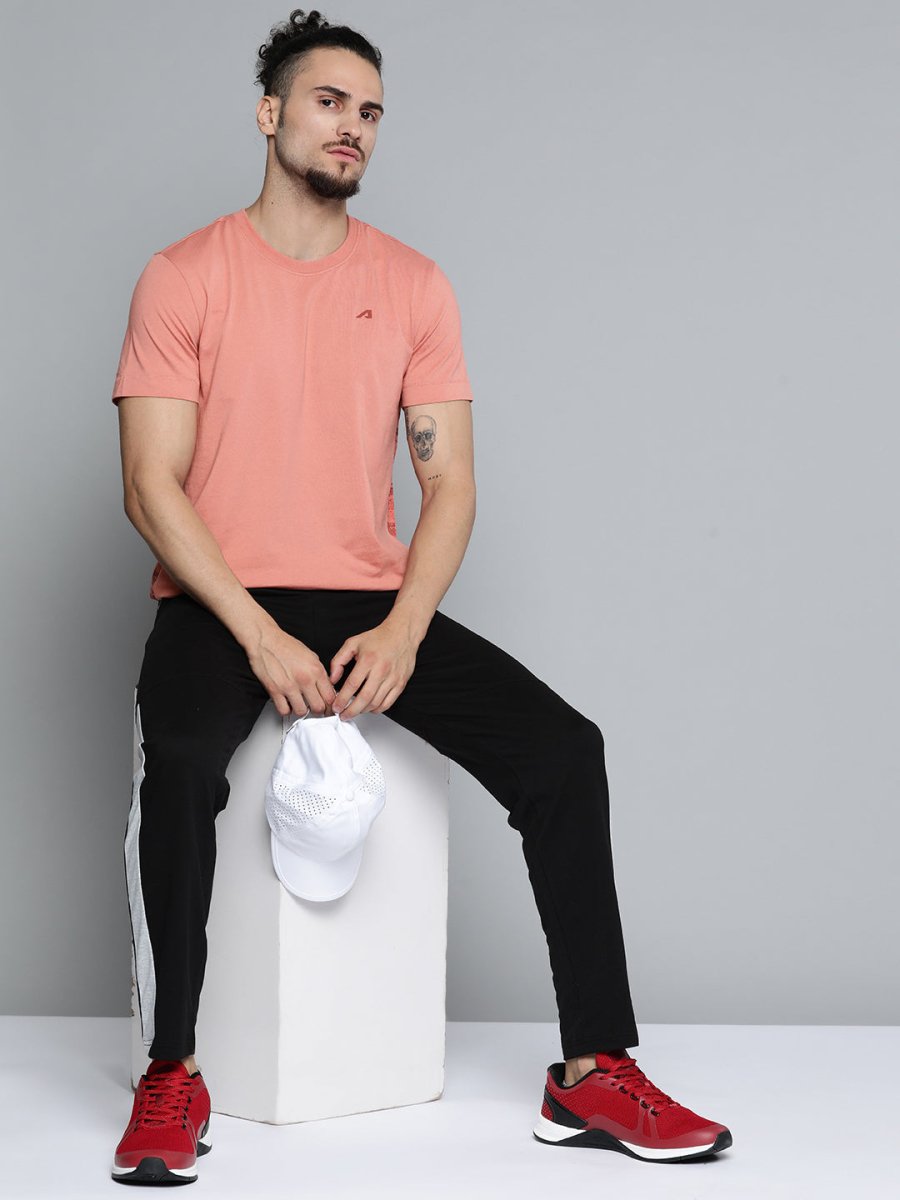 Alcis Men Dusty Pink Solid Slim Fit Gym T-shirt | Grocsy