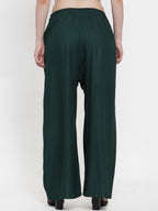 TAG 7 Women Green Solid Flared Palazzos | Grocsy