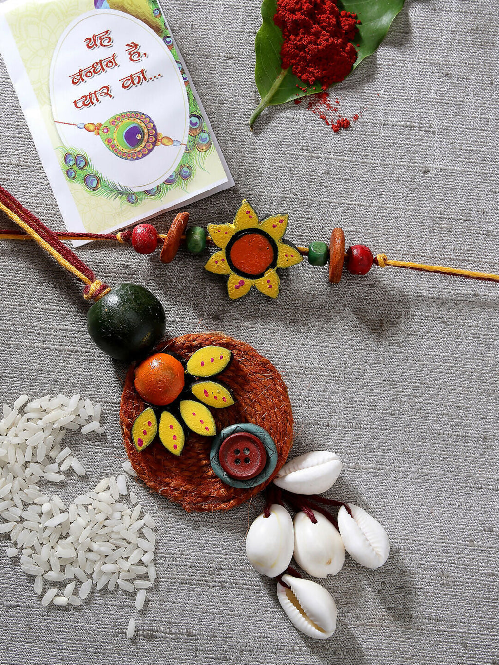 NVR Women & Men Set of 2 Multicolor Sea Shell Handcrafted Bhaiya Bhabhi Rakhi With Roli Chawal | Grocsy