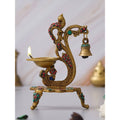 eCraftIndia Gold Toned Peacock Shaped Traditional Brass Diya With Bell & Stand | Grocsy
