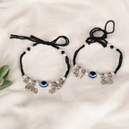 NVR Women Set of 2 Black Evil Eye Rakhi With Roli Chawal | Grocsy