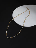 Gold-Toned White Brass Gold-Polished Necklace - Ruby Raang | Grocsy