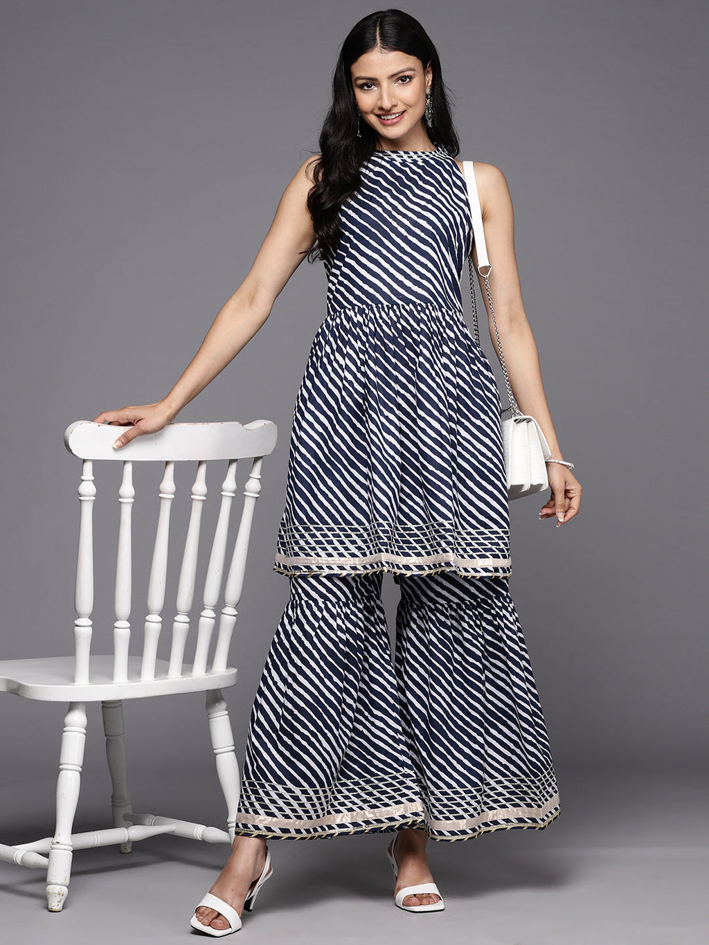 KSUT (House of Varanga) Blue And White Leheriya Halter Neckline Gota Work Kurta With Sharara | Grocsy